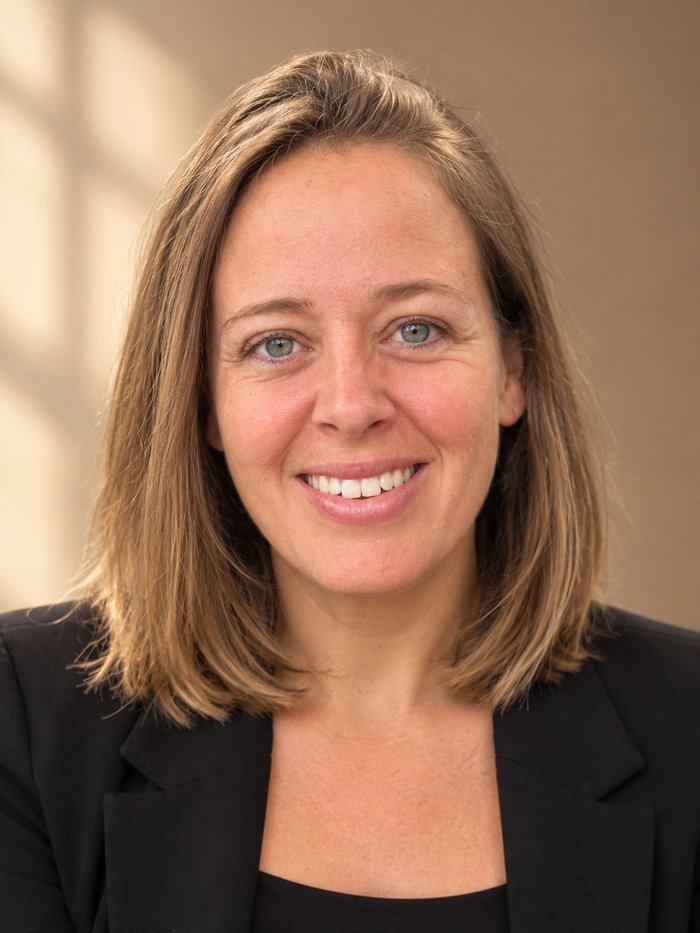 Portrait of Ashley Burk, lawyer, patent agent, and trademark agent
